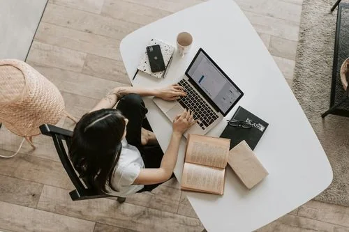 Student studying online with laptop — representing online class help services FAQs